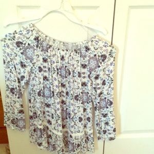 Justice shirt with flowers and ruffled bottom